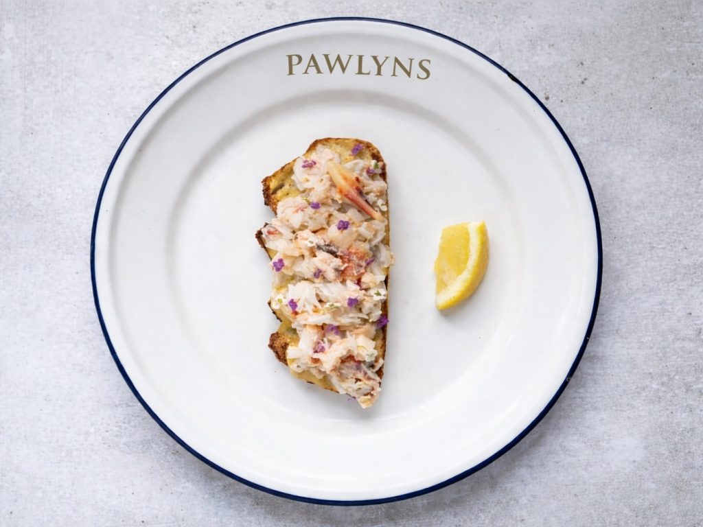 Fresh Cornish crab on toast with lemon served on a Pawlyns plate